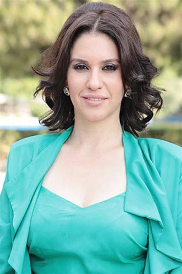 Evrim Alasya posing in her car (Source Instagram)