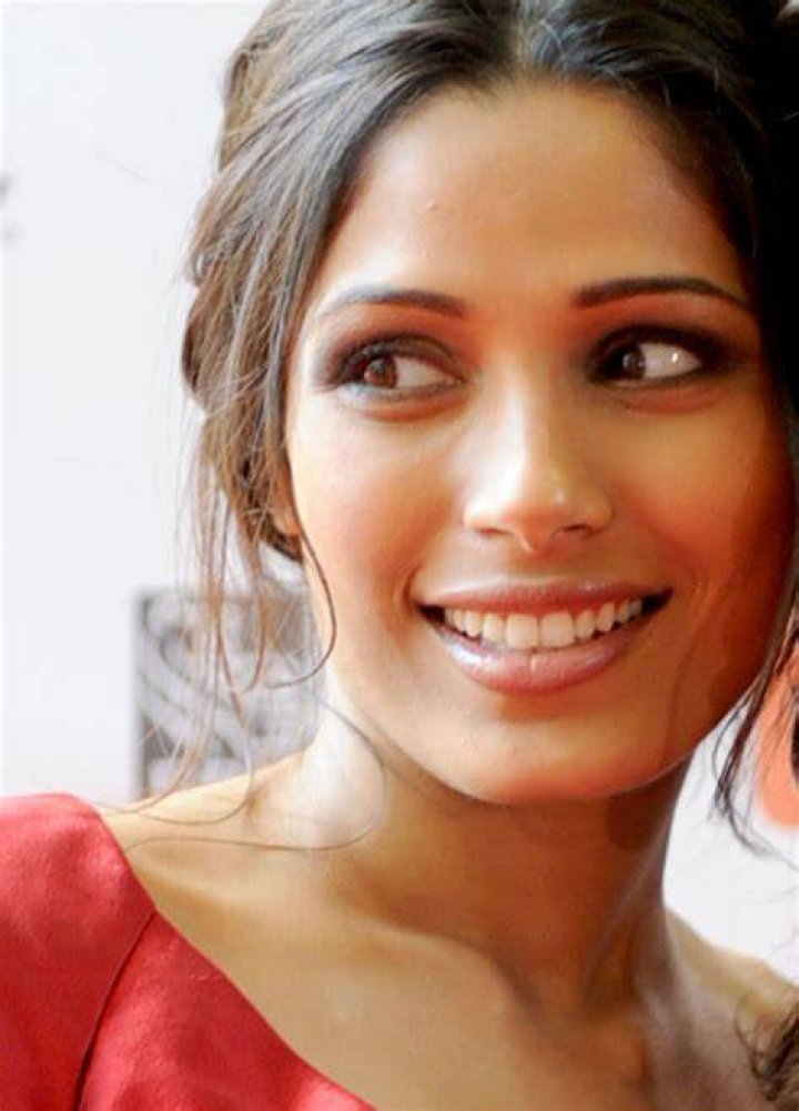 Freida Pinto makes cute faces at the Apes press conference HQ